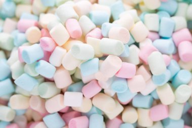 Şekerlemeler. Renkli mini marşmelovların arkaplan ya da dokusu.