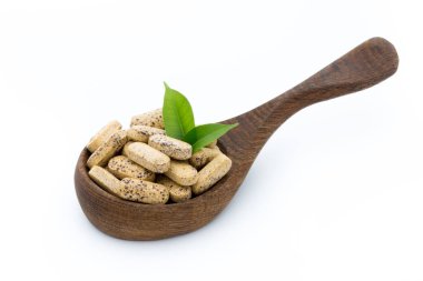 Vitamin kapsülleri, alternatif tıp homeopatik takviyesi.