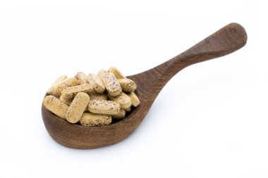 Vitamin kapsülleri, alternatif tıp homeopatik takviyesi.