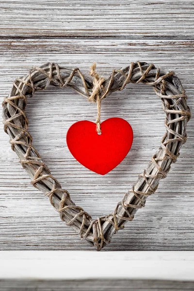 Braided Wicker Heart Red Heart Middle Wooden Background — Stock Photo, Image