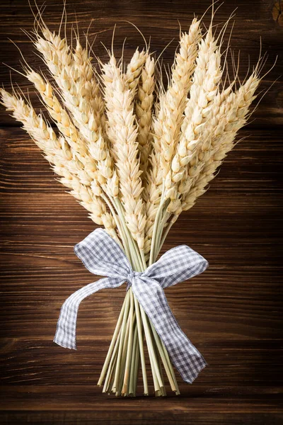 Wheat Bunch Blue Ribbon Wooden Background — Stock Photo, Image