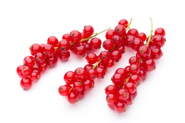 Kırmızı frenk üzümleri beyaz arkaplanda hala izole bir yaşam sürüyor.