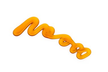 Beyaz arkaplanda bal damlası izole edildi.