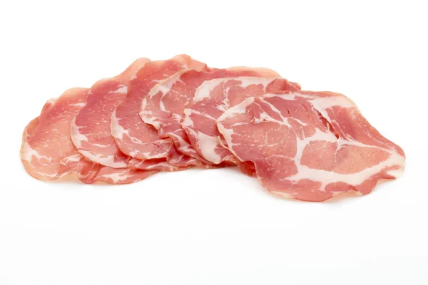 Fette di carne suina essiccata. Delicatessa. — Foto Stock