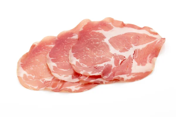 Fette di carne suina essiccata. Delicatessa. — Foto Stock