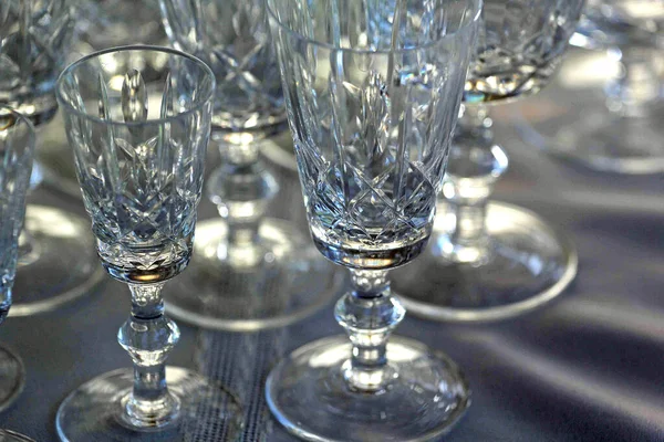 Various types of glasses from glassware of cross and olive