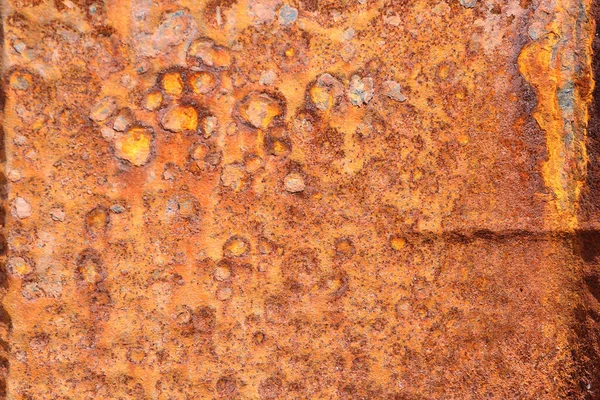 Metallic rusted plates in orange and brown — Stock Photo, Image