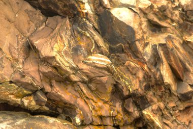 Arka plan olarak kullanılmak üzere çeşitli doku ve renklerin Rocky oluşumları