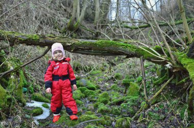 Little girl in a forrest