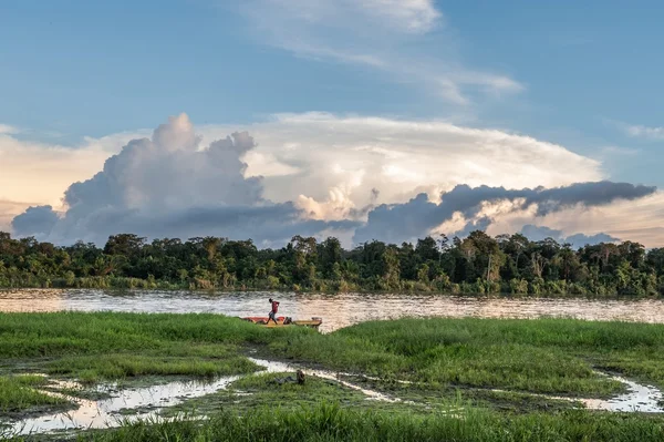 Unknown man on the river bank — Stock Photo, Image