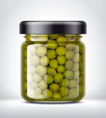 Arka planda Bezelyeler olan Cam Kavanoz. 