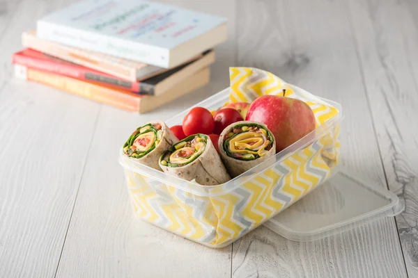 Ham and cheese wraps in lunch box — Stock Photo, Image
