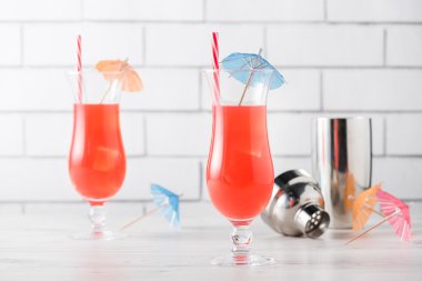 Fresh home made Singapore Sling cocktails clipart