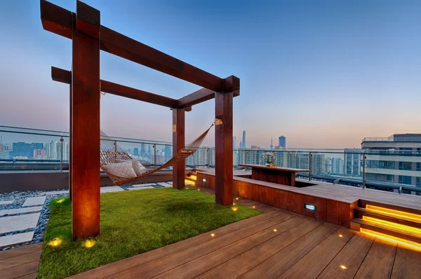 Roof terrace with hammock on a sunny day — Stock Image Roof terrace with hammock on a sunny day Stock Image