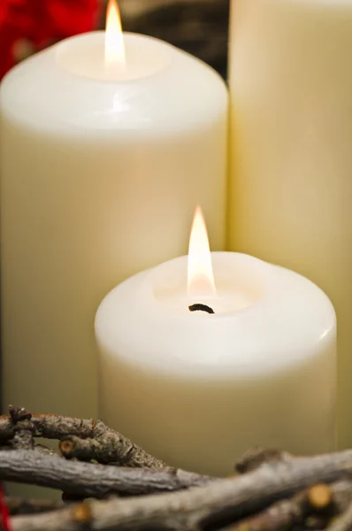 White candles in autumn winter decoration — Stock Photo, Image