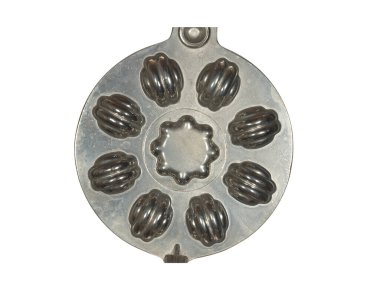 Beyaz arkaplanda izole edilmiş ev yapımı kurabiye ve waffle kalıpları.       