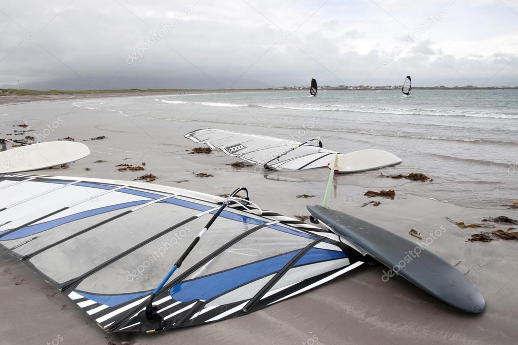 wind surfers braving the storm