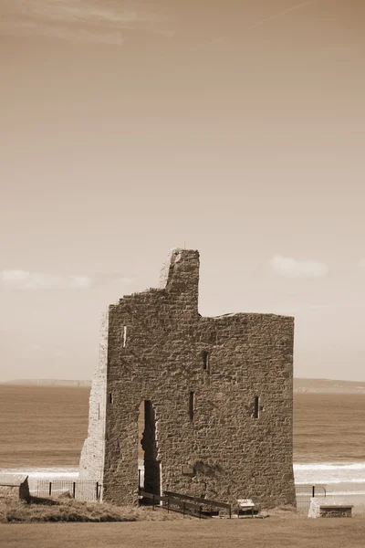 Ballybunion hradní zříceniny v sépie — Stock fotografie