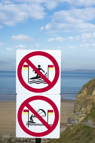 Large warning signs for surfers in ballybunion — Stock Image Large warning signs for surfers in ballybunion Royalty Free Stock Photos