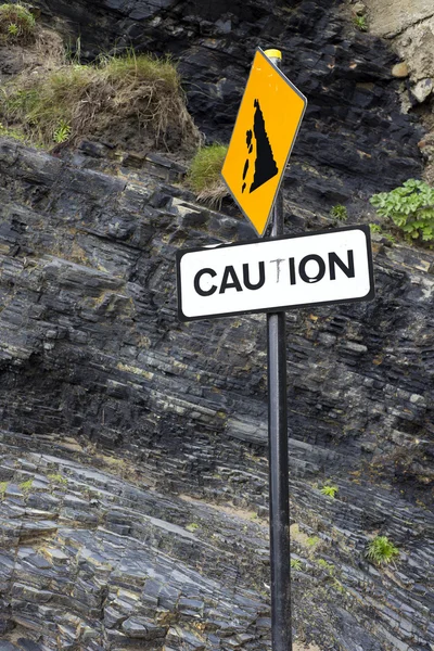 Caution rock fall sign on Ballybunion beach — Stock Photo, Image