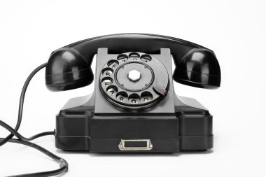 Beyaz bir arka plan üzerinde siyah vintage telefon