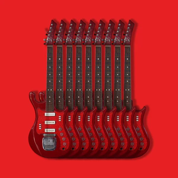 Μουσικό όργανο - ηλεκτρικές κιθάρες σε κόκκινο φόντο — Φωτογραφία Αρχείου
