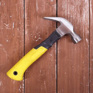 Aletler İnşa ve onarım - Ahşap bir arka planda üst görünüm pençe çekici.
