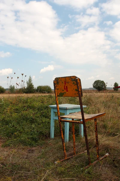 Old chairs in the field