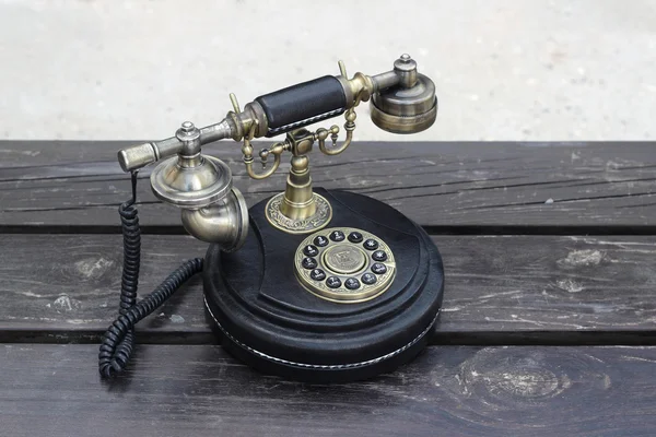 Teléfono vintage en tablones — Foto de Stock