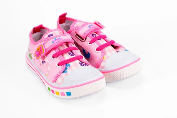 Children pink sneakers — Stock Photo, Image