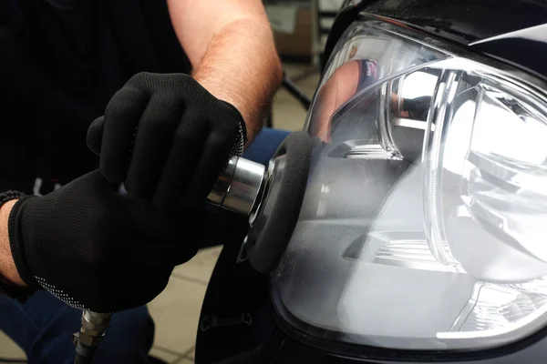 Car service. Polishing of optics of the car 3 — Stock Photo, Image