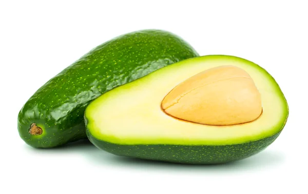 Hele en halve avocado op witte achtergrond — Stockfoto