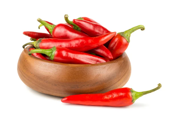 Red hot chili peppers in wooden bowl — Stock Photo, Image