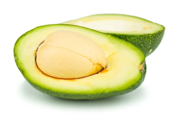 Две половинки авокадо — стоковое фото