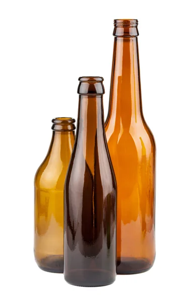 Üç boş kahverengi şişe — Stok fotoğraf