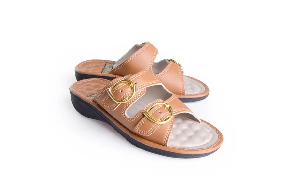 Sko. kvinnan sandal på bakgrund. kvinnan sandal på en bakgrund. — Stockfoto