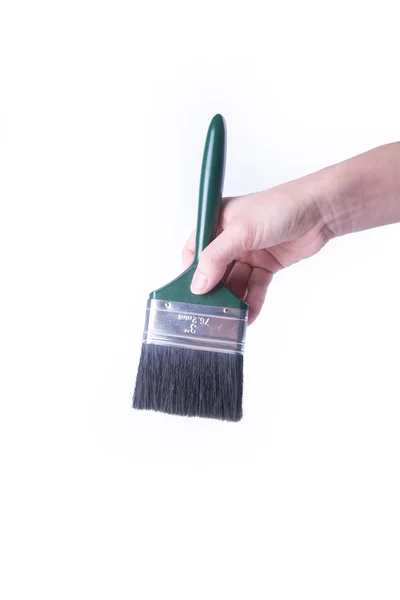 Paint brush with hand. paint brush with hand on a background. — Stock Photo, Image