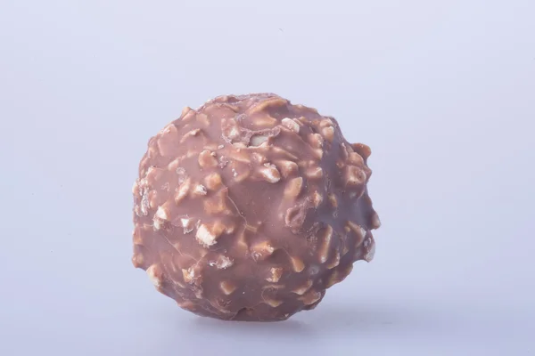 Čokoládové koule nebo čokoládový bonbon na pozadí. — Stock fotografie