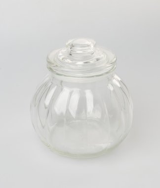 Bir arka plan üzerinde cam şişe veya şeker kavanoz.