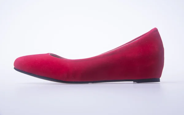 Παπούτσι. κόκκινο και μόδα παπούτσια γυναίκα σε φόντο. — Φωτογραφία Αρχείου