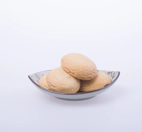 Galletas o galletas de mantequilla sobre un fondo . — Foto de Stock