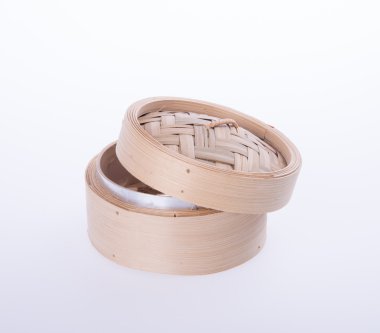 Bambu vapur veya arka plan üzerinde dim sum vapur.