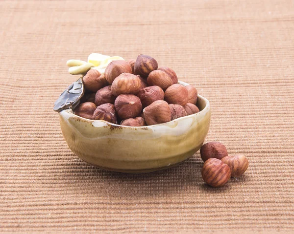 Gila. hazelnut di latar belakang — Stok Foto