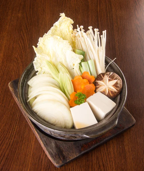 Japanese cuisine. hot pot on the background — Stock Photo, Image