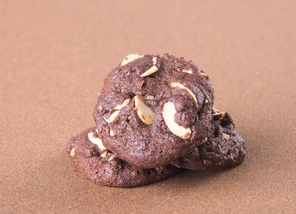 Almendras galletas chips de chocolate en el fondo — Foto de Stock