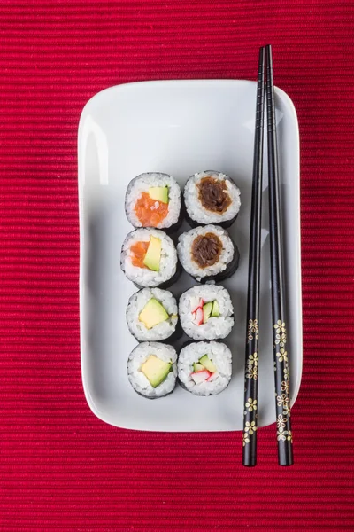 Cocina japonesa. sushi en el fondo —  Fotos de Stock