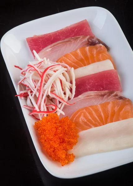 Japanese cuisine. sashimi on the background — Stock Photo, Image