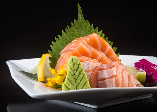 Japonská kuchyně. sašimi na pozadí — Stock fotografie