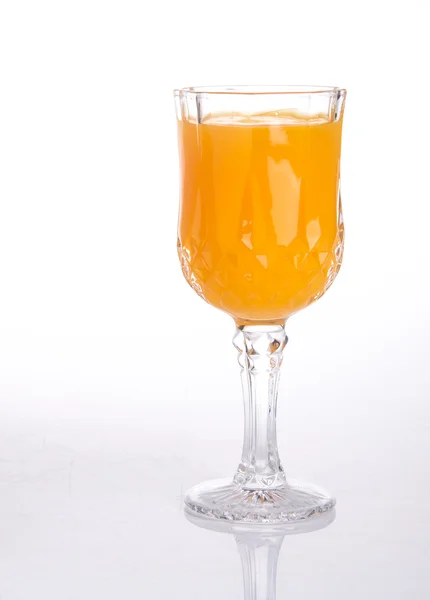 Orangensaft auf einem Hintergrund — Stockfoto