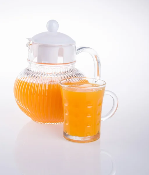 Orangensaft auf einem Hintergrund — Stockfoto